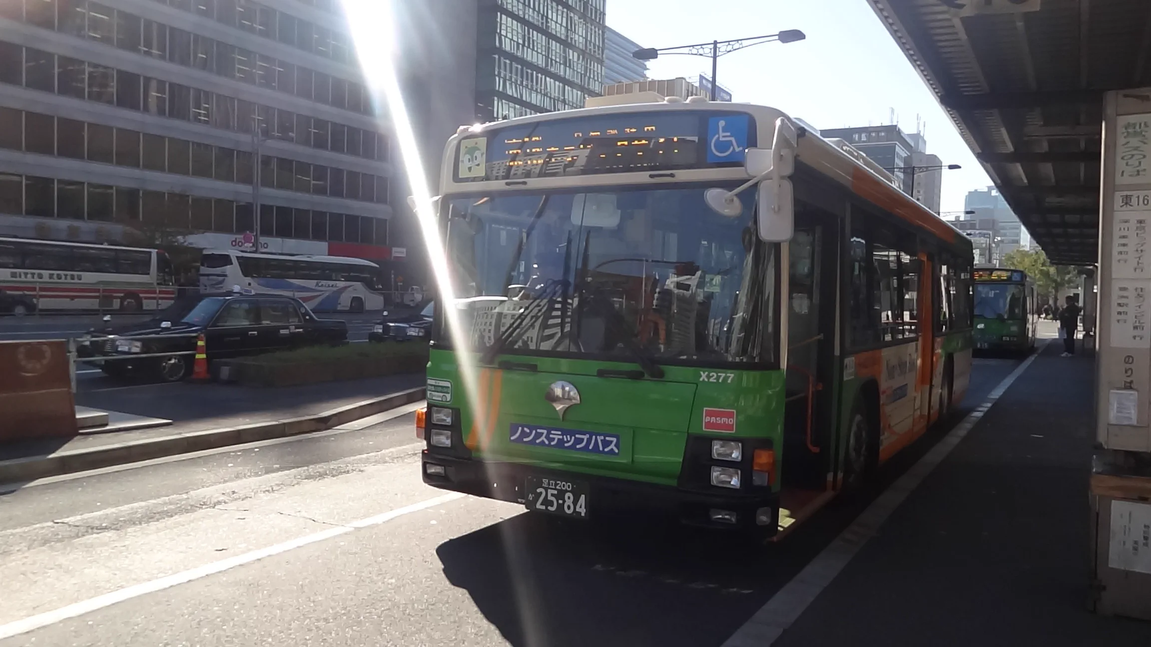 How to ride buses in Japan using front or rear doors, numbered tickets and IC cards