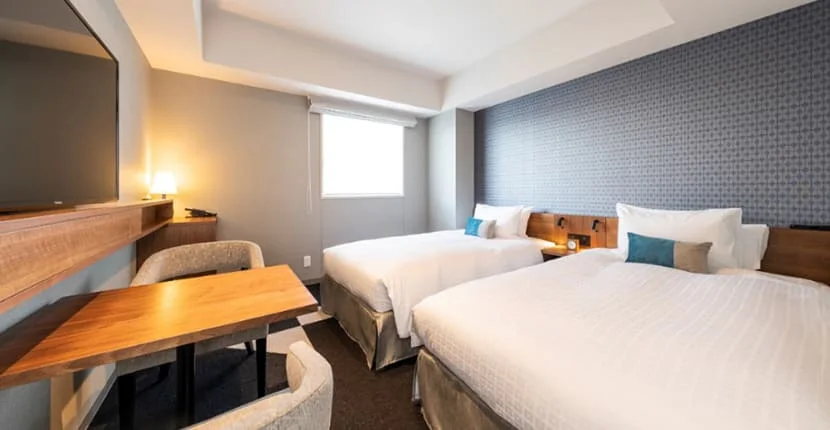 Lave-linge séchant dans une chambre Tokyu Stay Sapporo Odori