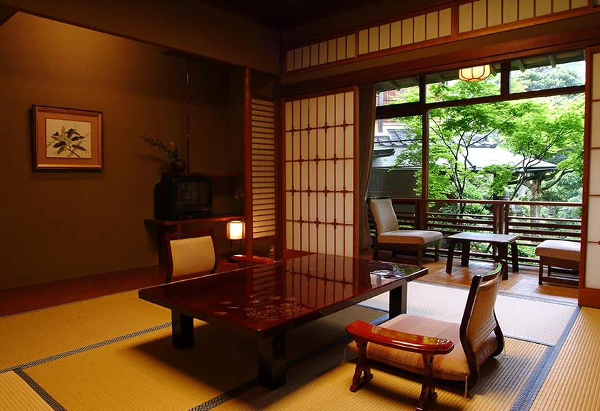 Nishimuraya Honkan traditional Japanese guest room overlooking the ryokan garden