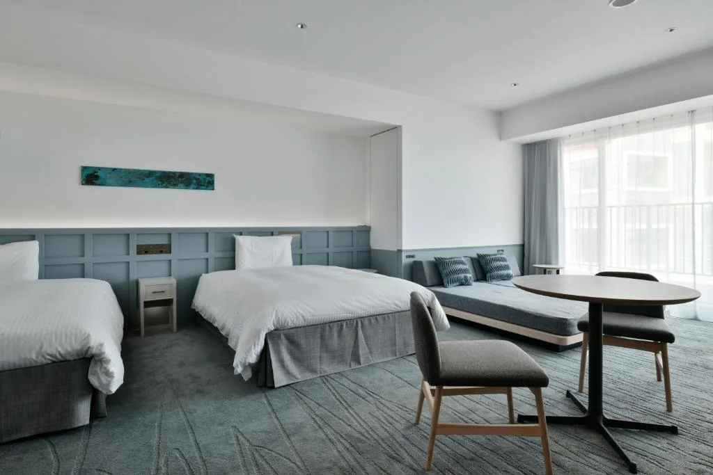 LeQu Okinawa Chatan Spa and Resort modern suite with two beds