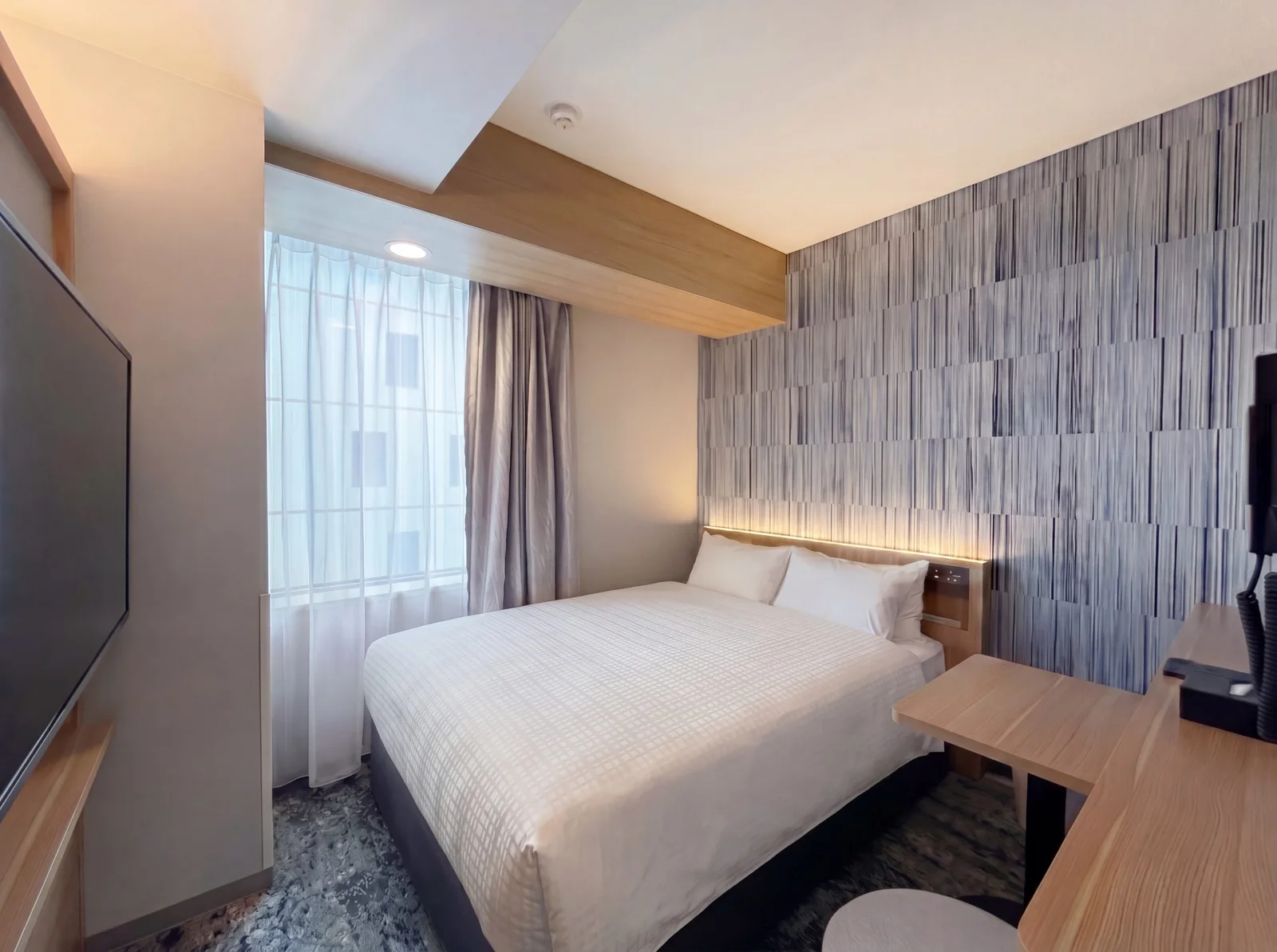 Hotel Gracery Sapporo ou Hotel Emion Sapporo : lequel choisir avec de grosses valises en hiver ?
