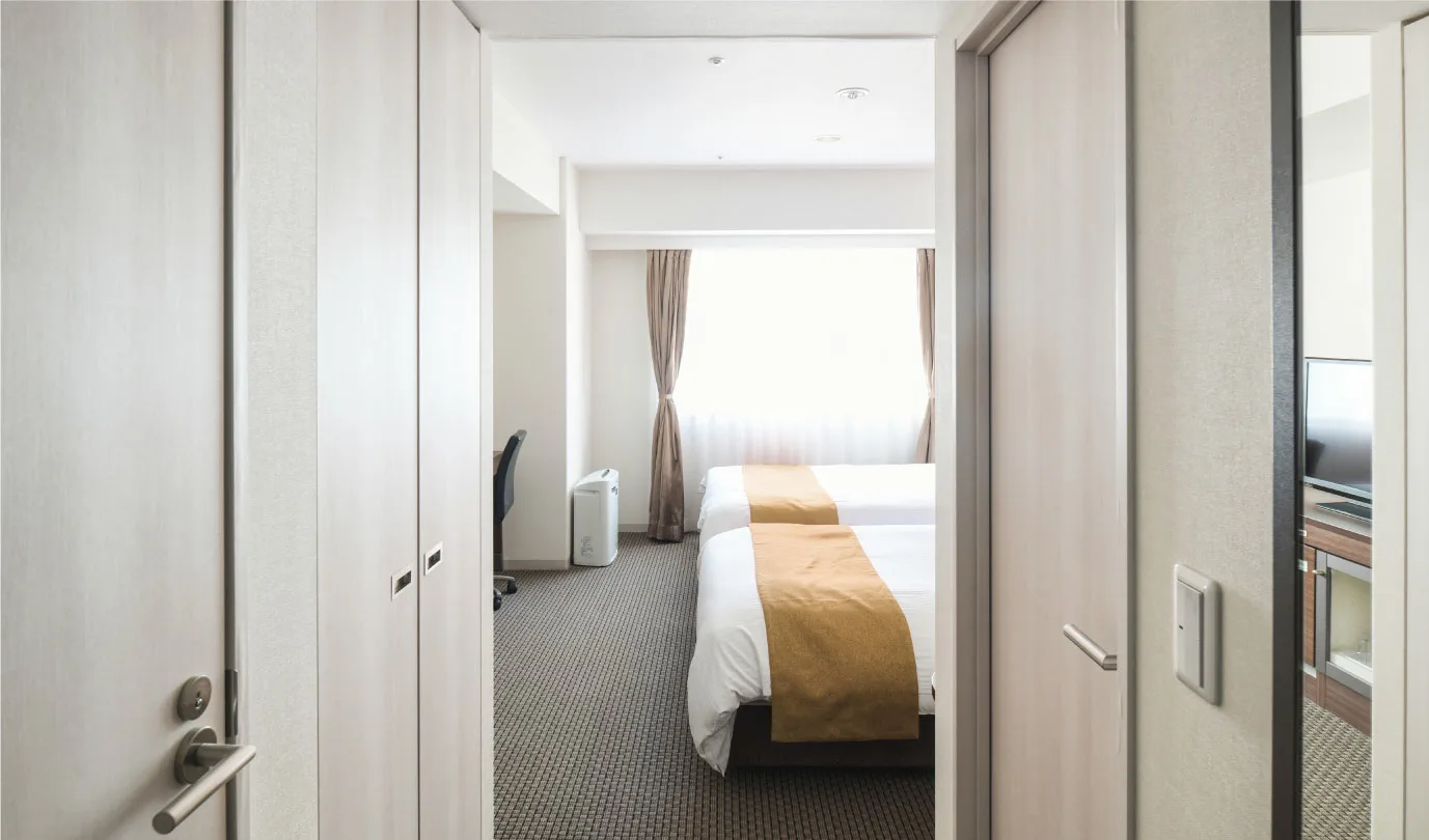 Chambre du Vessel Inn Sapporo Nakajima Park et espace disponible autour des lits