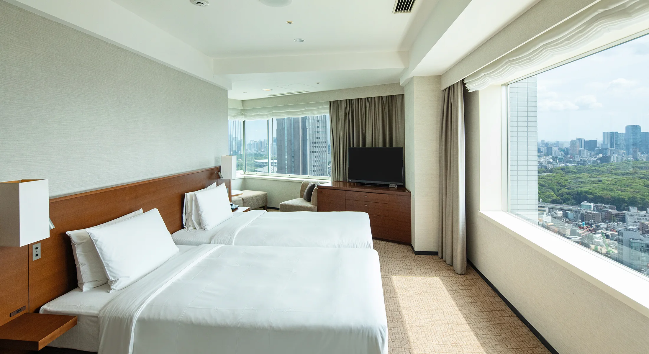 Chambre et espace de couchage du Hotel Century Southern Tower