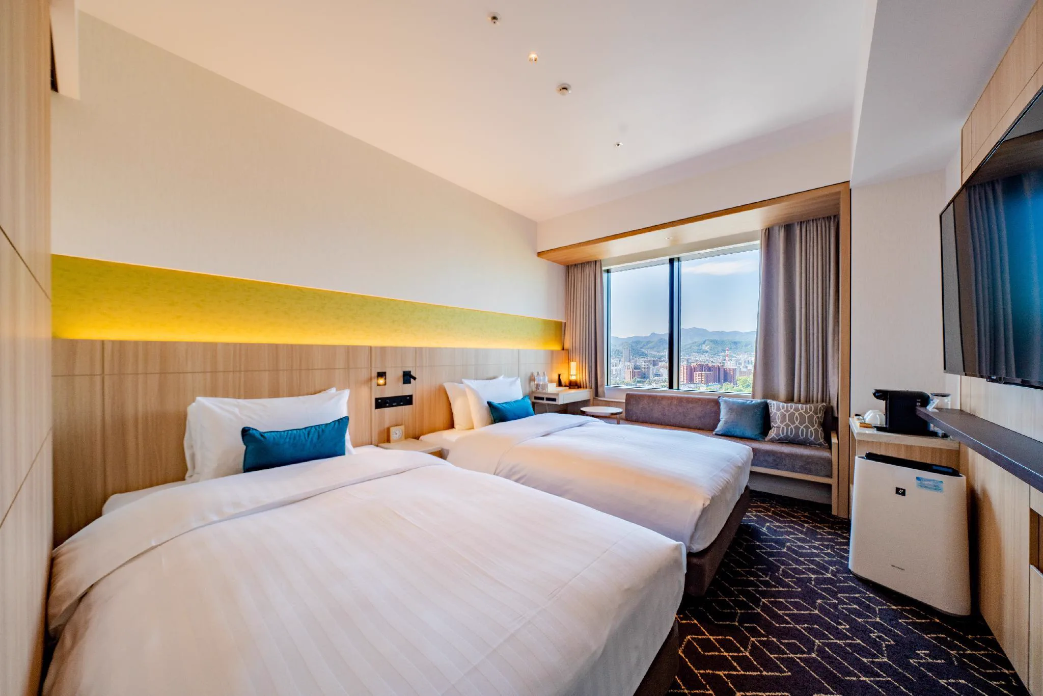 Chambres et espace de couchage à l’hôtel Keio Prelia Sapporo