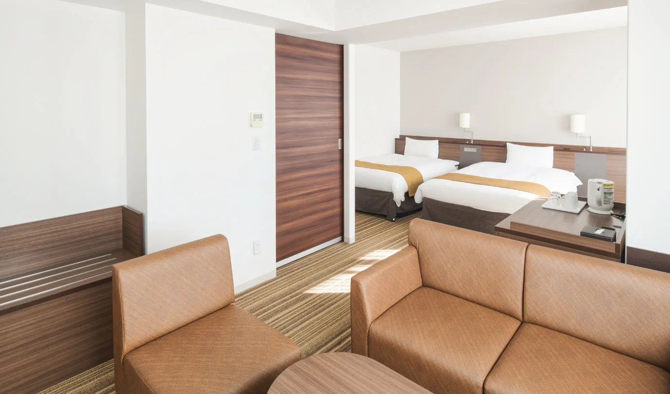 Chambre et espace de couchage à Vessel Inn Sapporo Nakajima Park