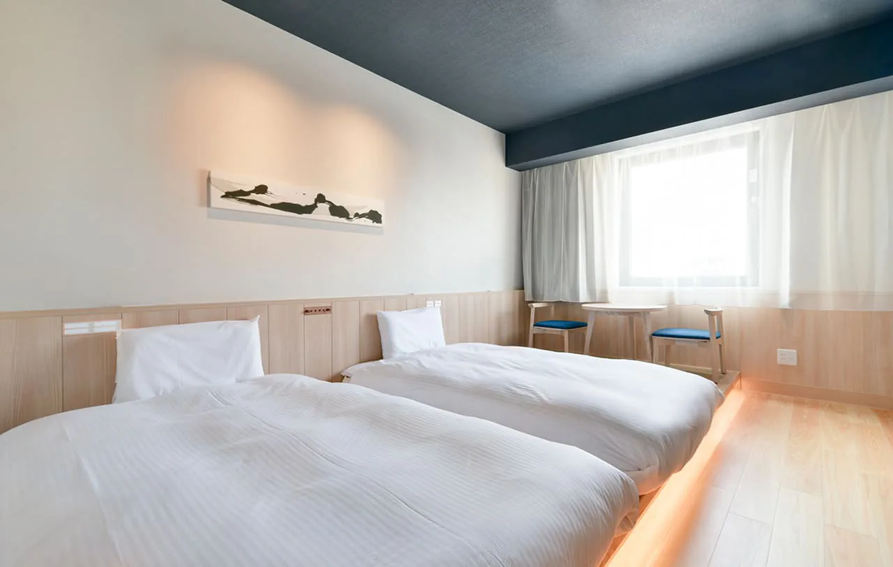 Chambres et espace de couchage de l'hôtel Vessel Hotel Campana Susukino